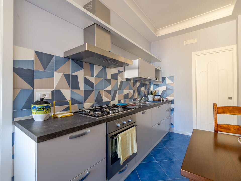 Comfort Apartment | Private kitchen | Full-size fridge, microwave, oven, stovetop