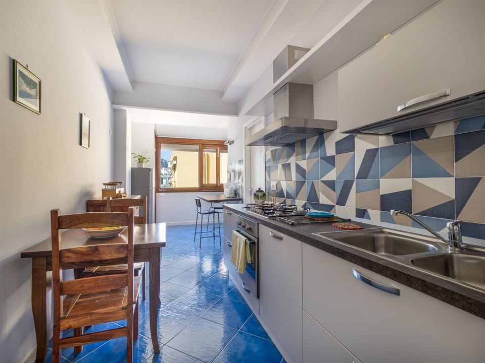 Comfort Apartment | Private kitchen | Full-size fridge, microwave, oven, stovetop