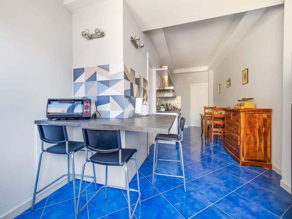 Comfort Apartment | Private kitchen | Full-size fridge, microwave, oven, stovetop