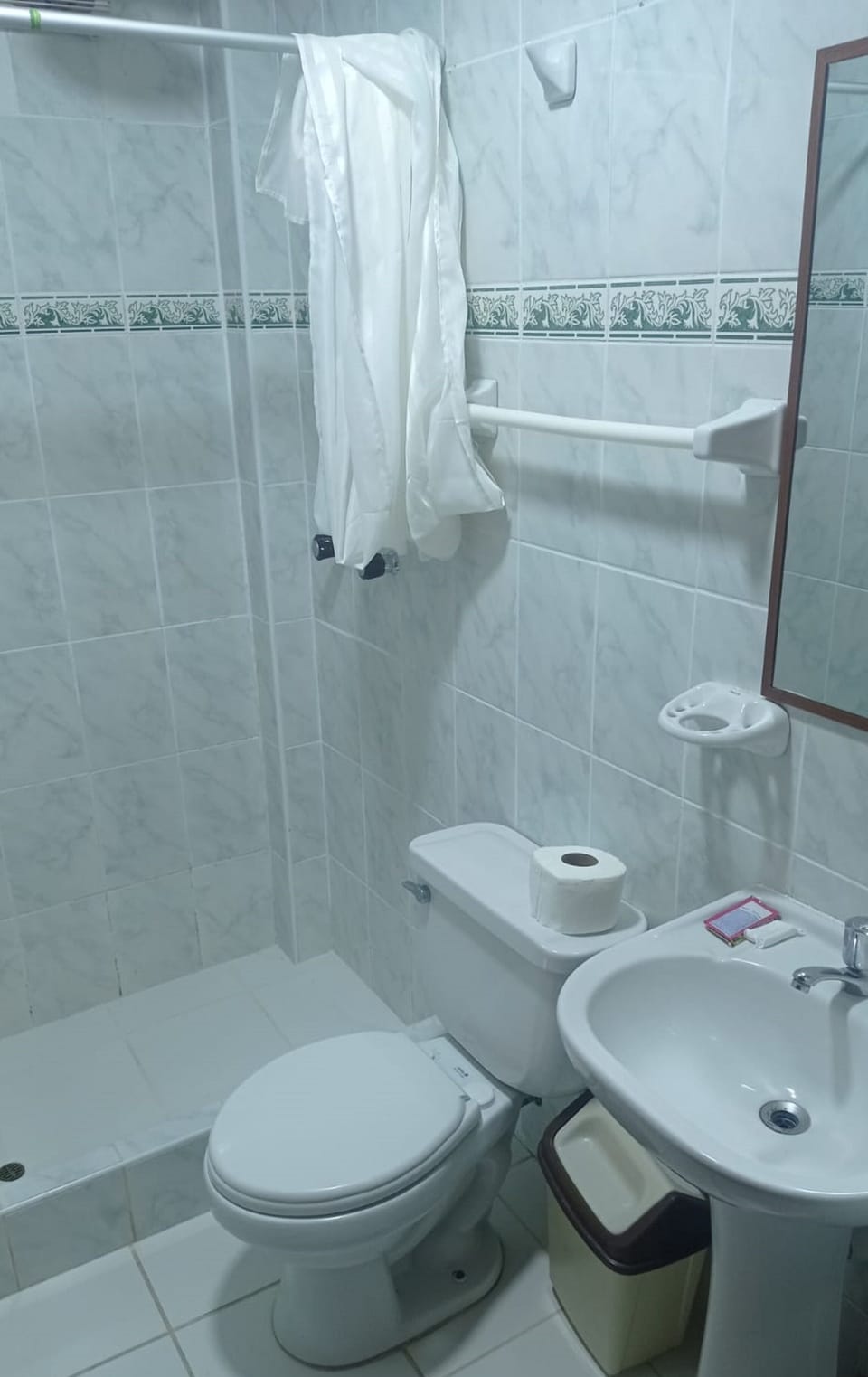 Shower, rainfall showerhead, towels, soap