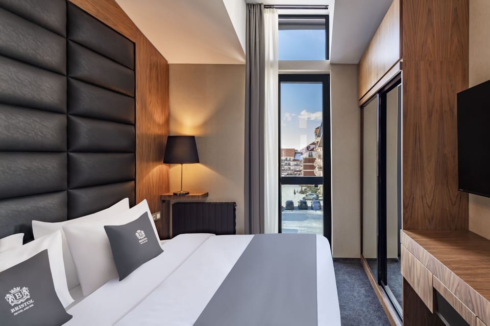 Standard Double or Twin Room | In-room safe, desk, laptop workspace, blackout drapes