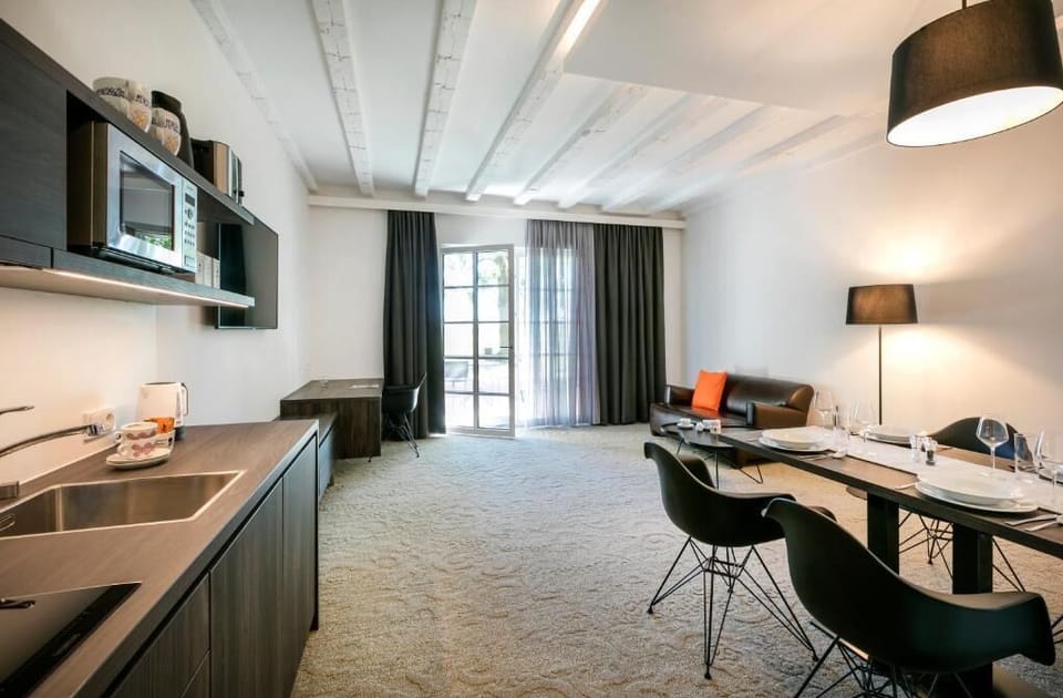Superior Apartment | Living area | 43-inch flat-screen TV with cable channels, TV
