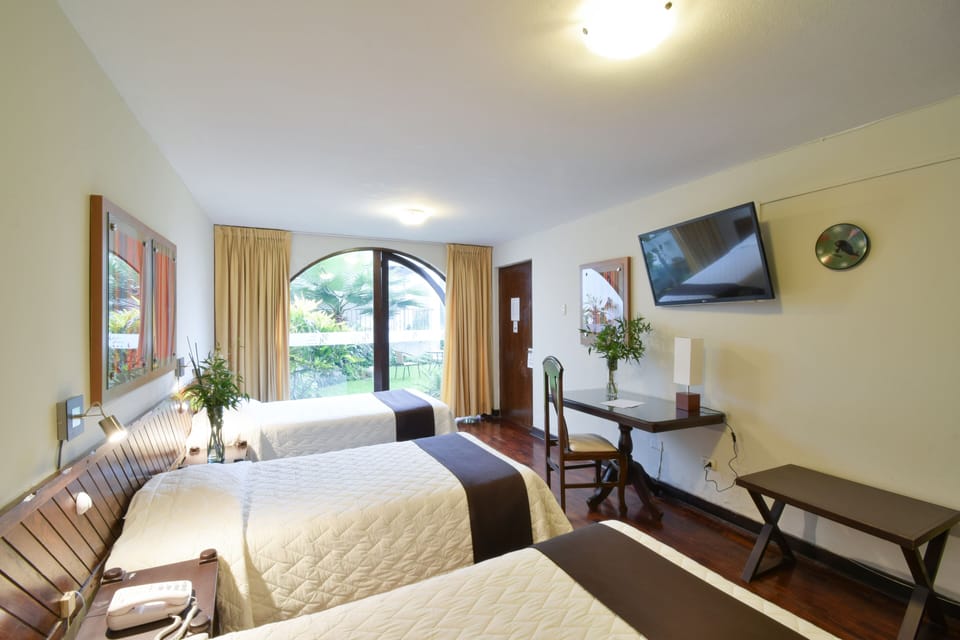 Triple Room | In-room safe, desk, cribs (free), rollaway beds (surcharge)
