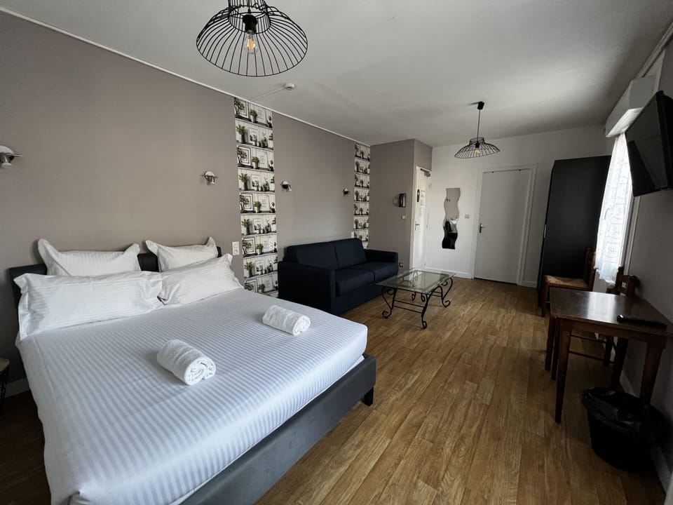 Family Room | Premium bedding, individually decorated, desk, laptop workspace