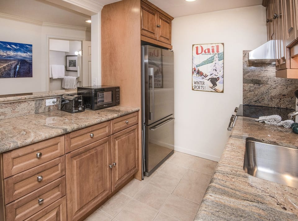 Condo, 2 Bedrooms | Private kitchen | Fridge, oven, coffee/tea maker, toaster
