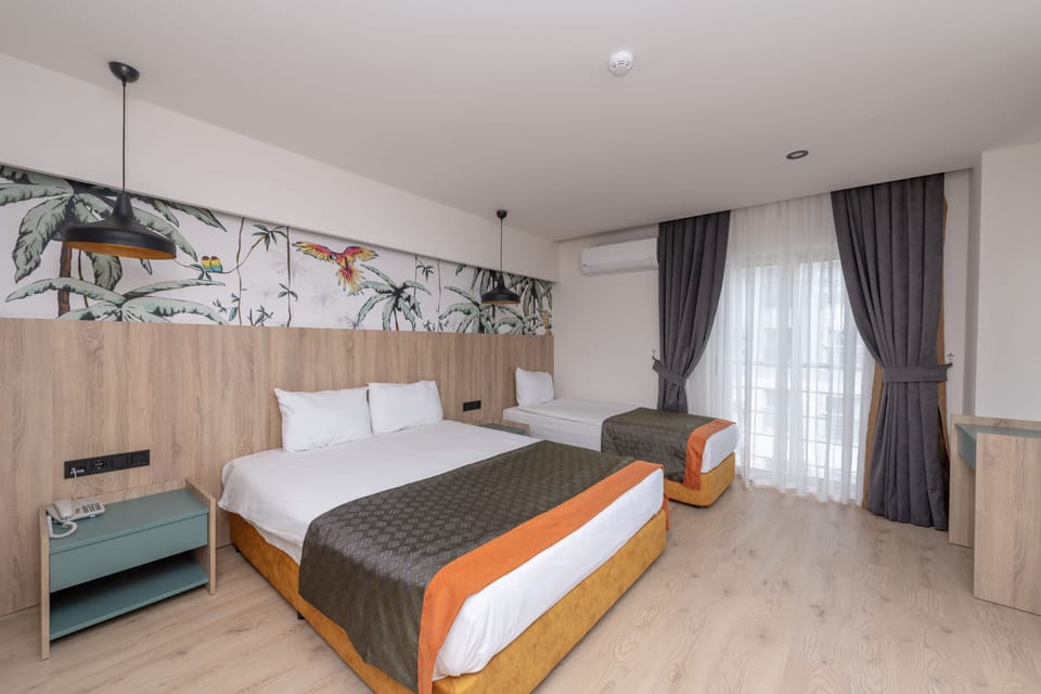 Minibar, desk, WiFi (free), bed sheets