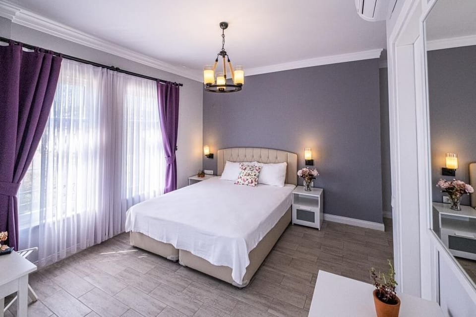 Elite Double Room, Garden View | Desk, blackout drapes, free WiFi, bed sheets