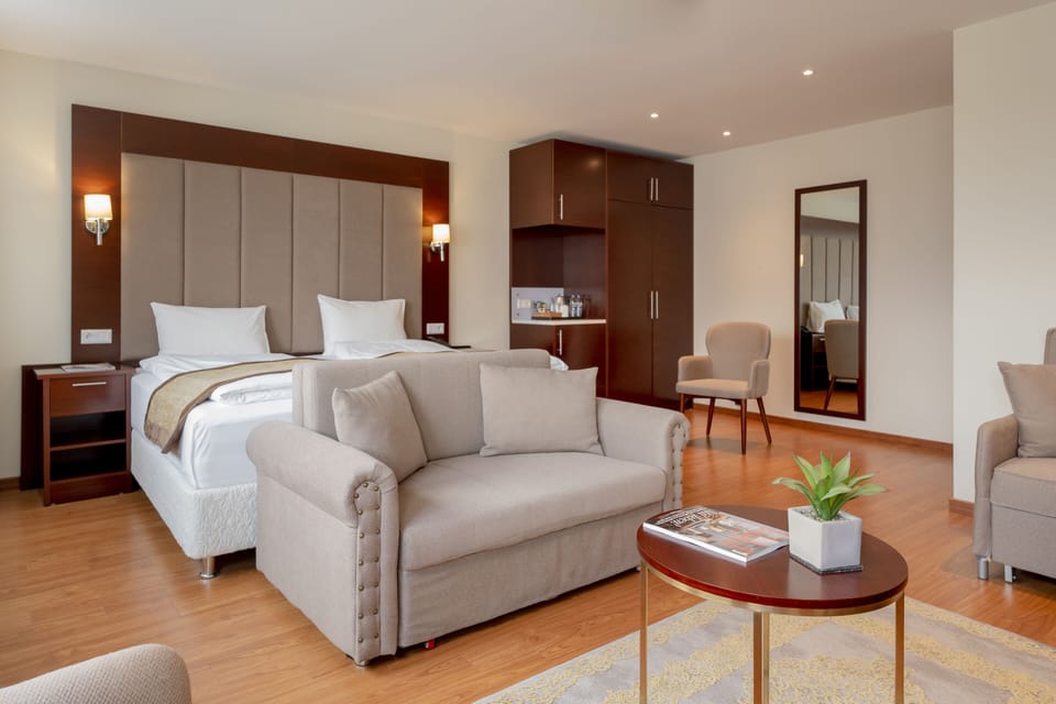 Business Quadruple Room | Select Comfort beds, in-room safe, desk, laptop workspace