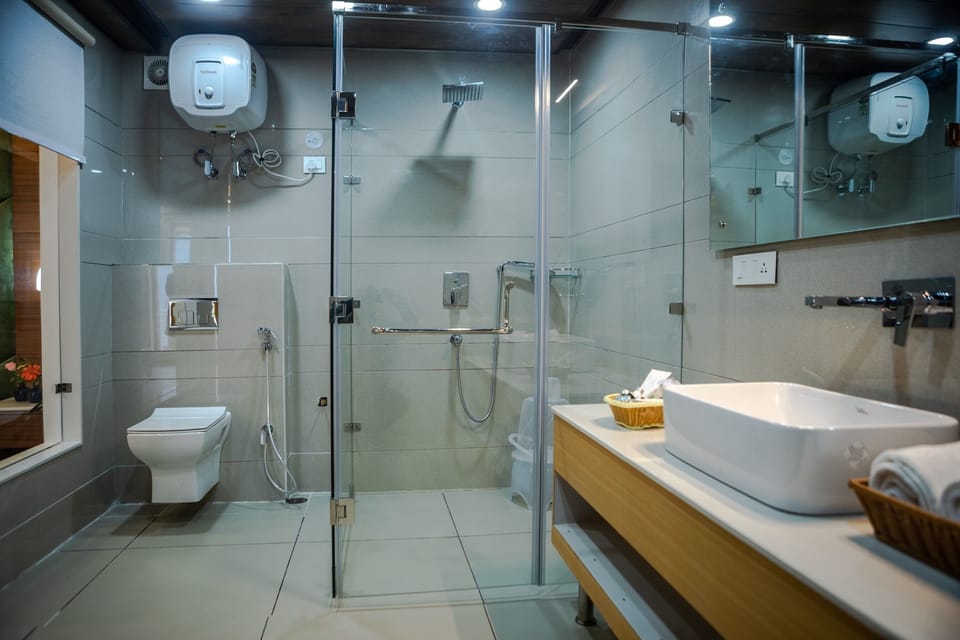 Shower, free toiletries, slippers, towels