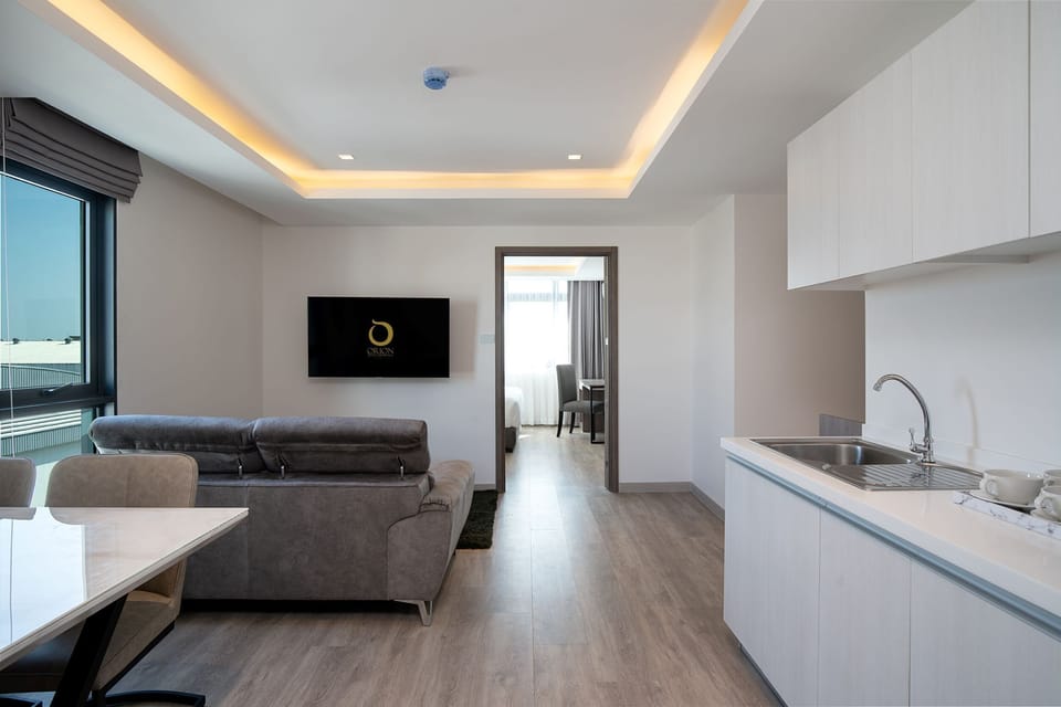 Family Quadruple Room | Private kitchen | Mini-fridge, electric kettle