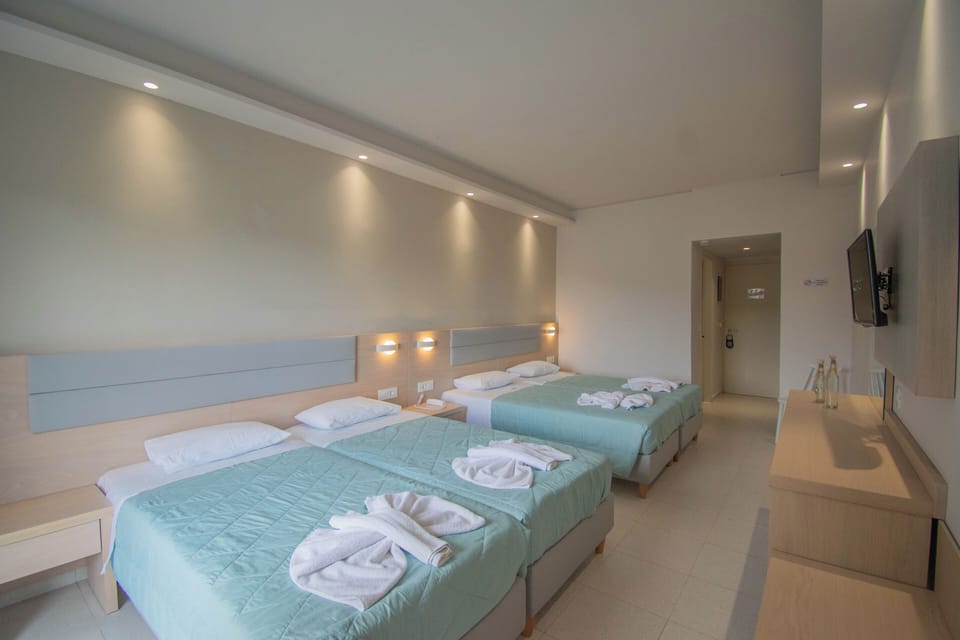 Family Room, Pool View, Poolside | In-room safe, desk, laptop workspace, blackout drapes