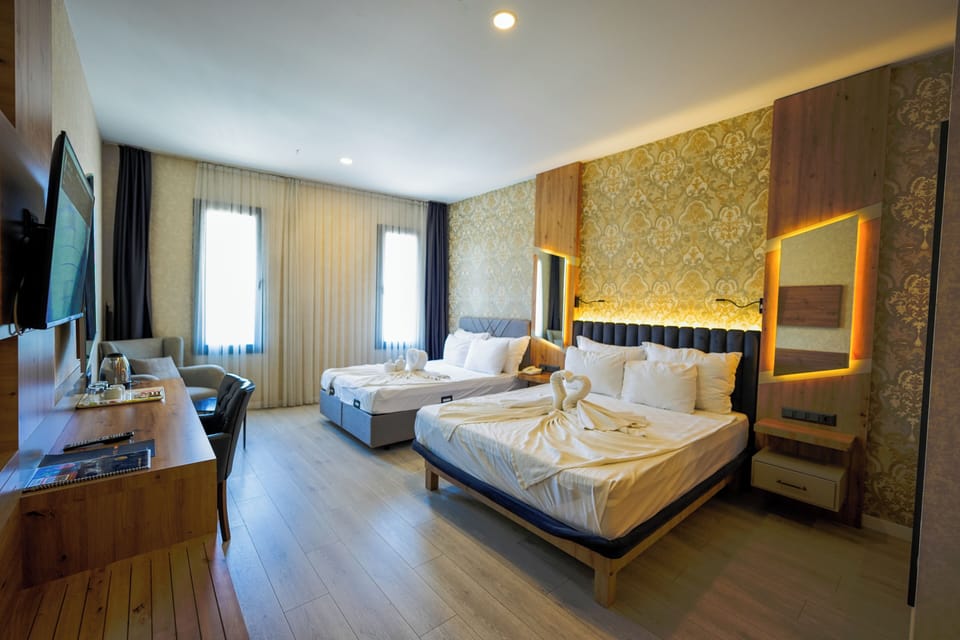 Superior Quadruple Room | Minibar, in-room safe, soundproofing, free WiFi