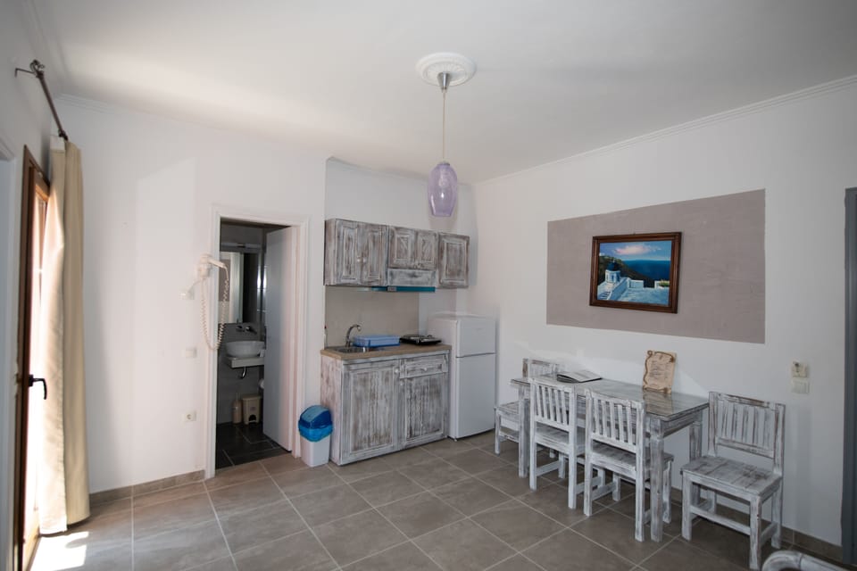 Superior Apartment, Balcony | Private kitchen | Mini-fridge, stovetop, electric kettle, cookware/dishes/utensils