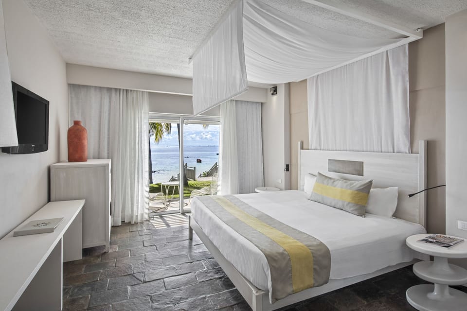 Deluxe Room, Sea View (Adults Only) | Minibar, in-room safe, WiFi (free), bed sheets