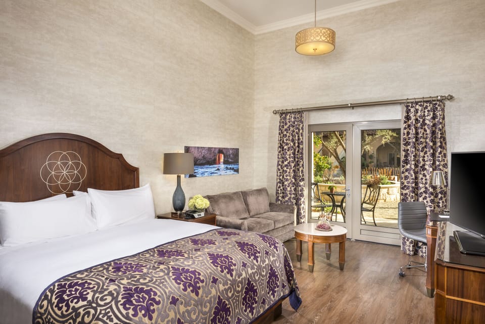 Premium bedding, down comforters, pillowtop beds, in-room safe