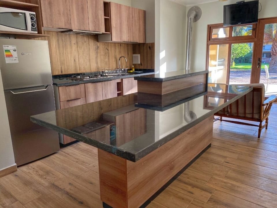 Deluxe Apartment, 2 Bedrooms | Private kitchen | Full-size fridge, microwave, cookware/dishes/utensils
