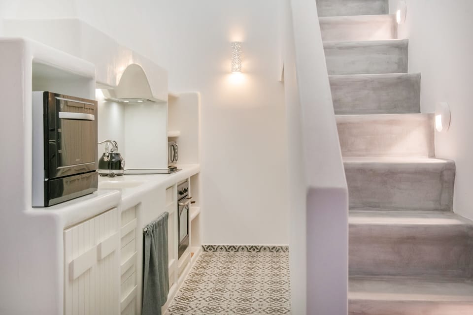 Suite, Private Pool | Private kitchen | Microwave, stovetop, electric kettle, toaster