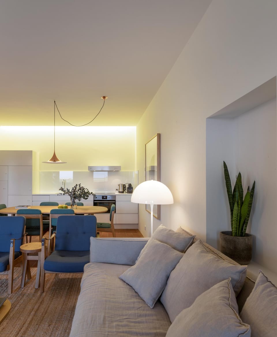 Design Apartment | Living area | 50-inch flat-screen TV with digital channels, iPod dock, heated floors