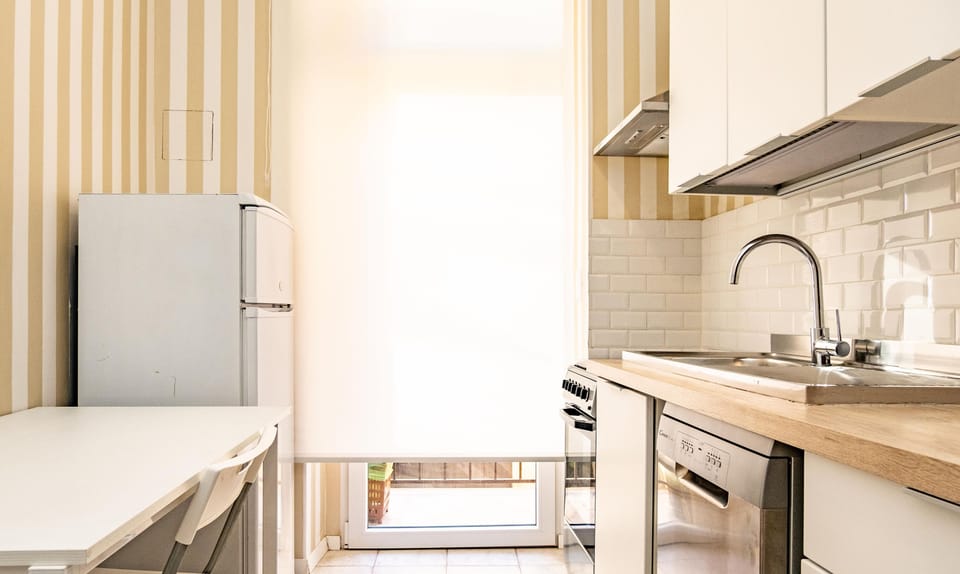 Fridge, electric kettle, toaster, cookware/dishes/utensils