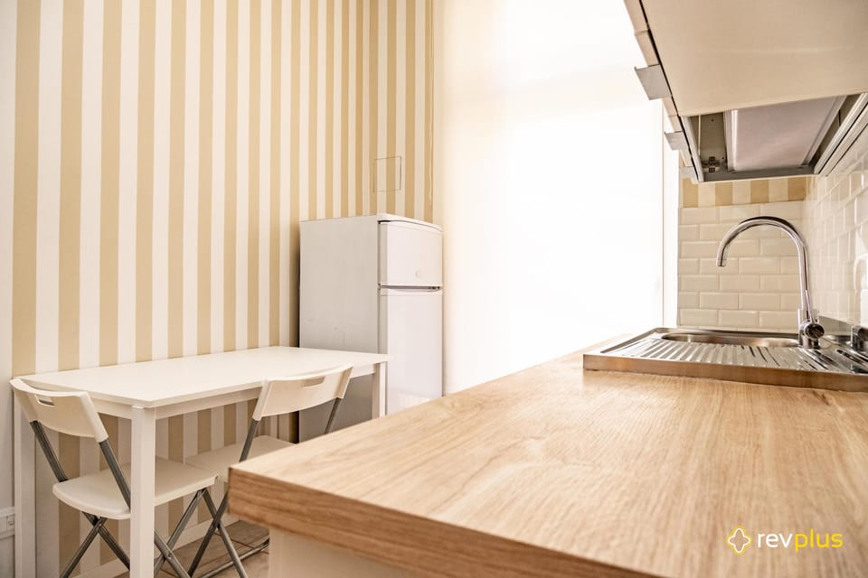 Fridge, electric kettle, toaster, cookware/dishes/utensils
