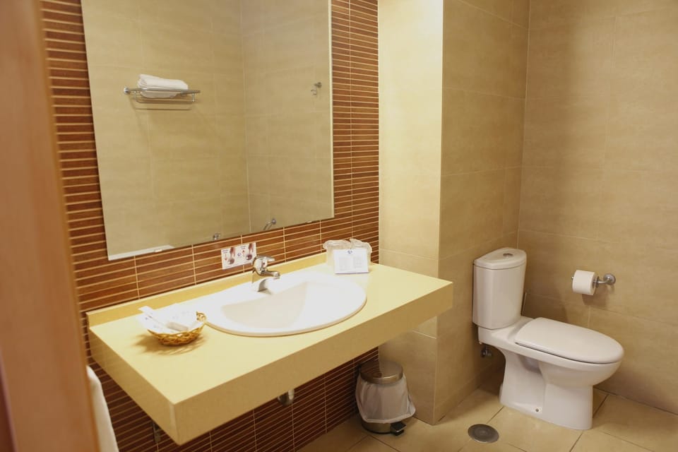 Free toiletries, hair dryer, bidet, towels