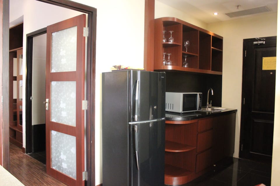 Suite, 1 Double Bed, Non Smoking, Refrigerator & Microwave (Living Room) | Living area | LCD TV