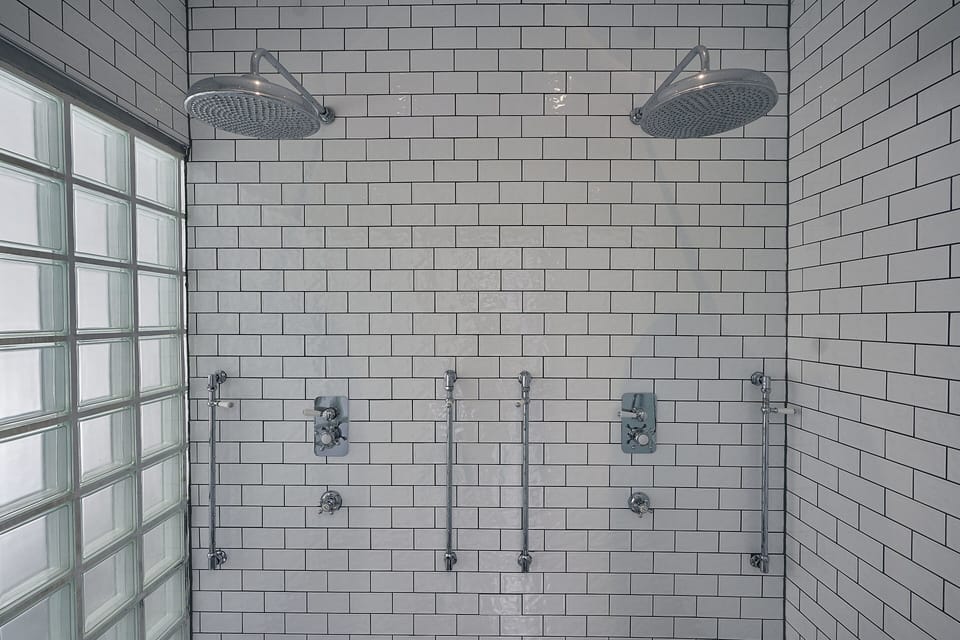 Signature Suite | Bathroom | Free toiletries, hair dryer, towels, soap