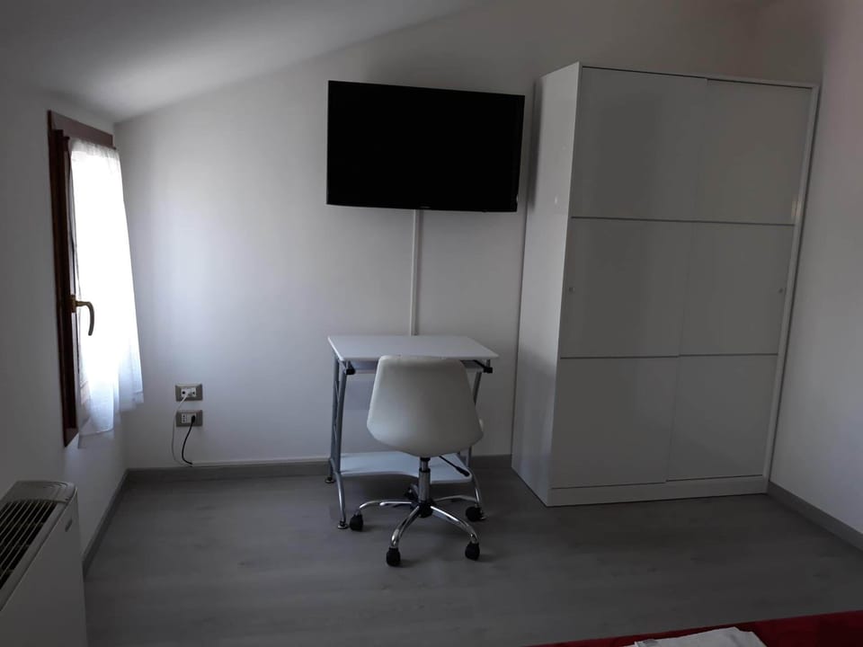 Down comforters, desk, laptop workspace, iron/ironing board (on request)