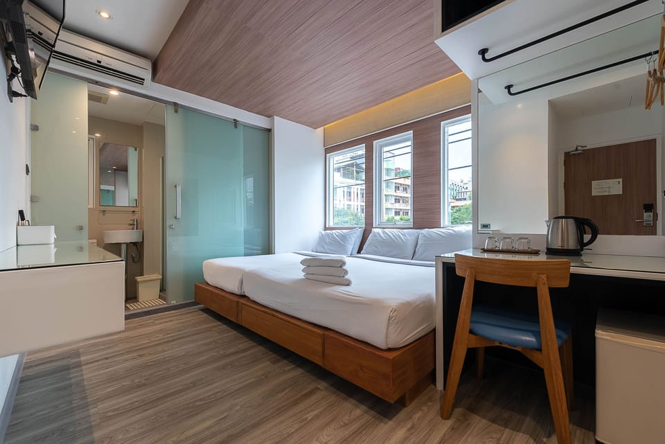 Everlasting (Deluxe) triple room | Minibar, in-room safe, desk, blackout drapes