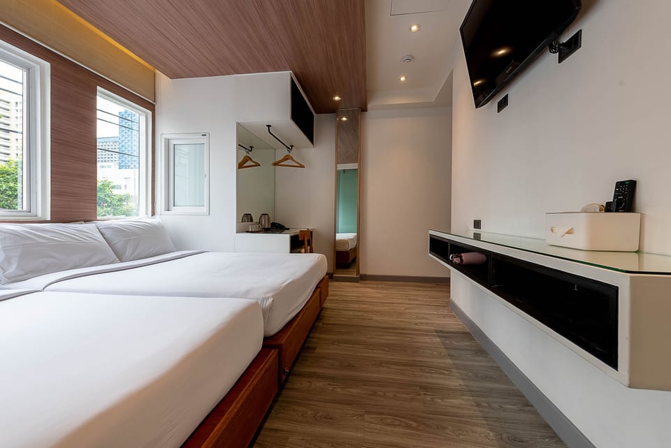 Everlasting (Deluxe) triple room | Minibar, in-room safe, desk, blackout drapes