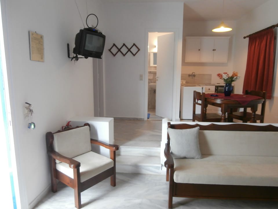 Classic Apartment, 1 Bedroom, Sea View (Upper Floor) | Living area | 28-inch LCD TV with digital channels, TV