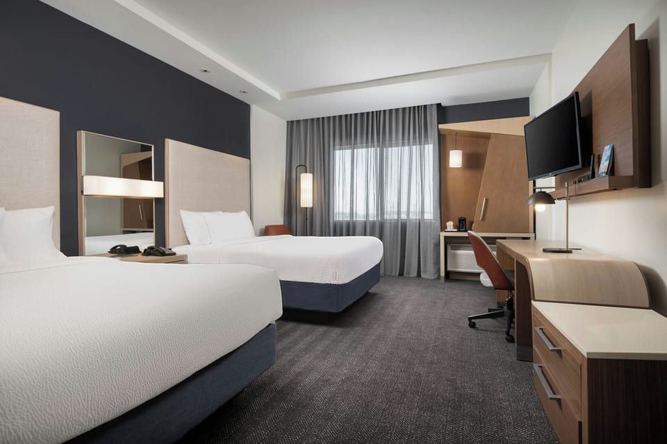 Room, 2 Queen Beds | In-room safe, desk, laptop workspace, iron/ironing board