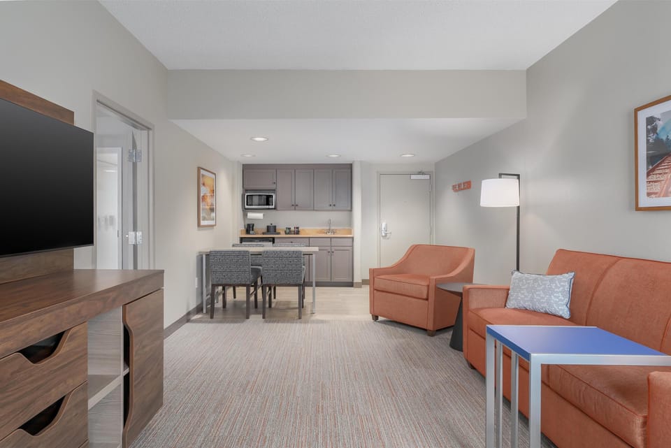 Suite, 2 Queen Beds, Non Smoking | Living area | 37-inch flat-screen TV with cable channels, TV