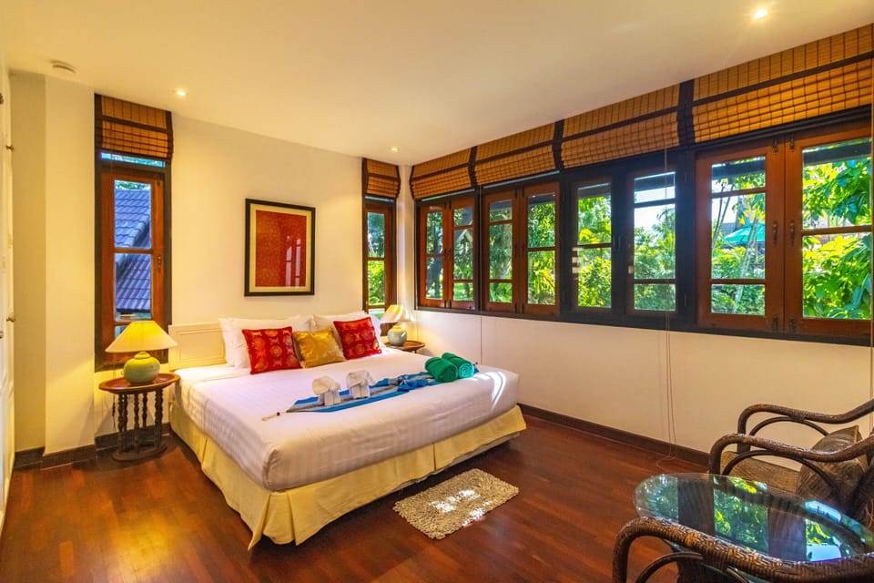 Apartment, 1 Bedroom, Garden View | Minibar, in-room safe, individually decorated, free WiFi