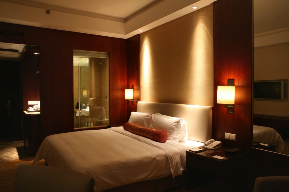Executive Room, City View | Hypo-allergenic bedding, down comforters, pillowtop beds, free minibar