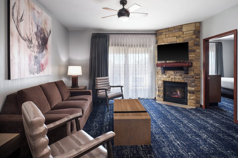 50-inch TV with cable channels, fireplace