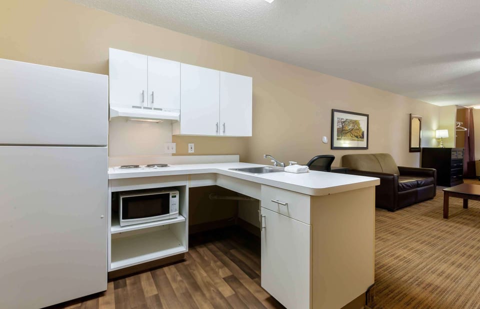 Fridge, microwave, stovetop, coffee/tea maker