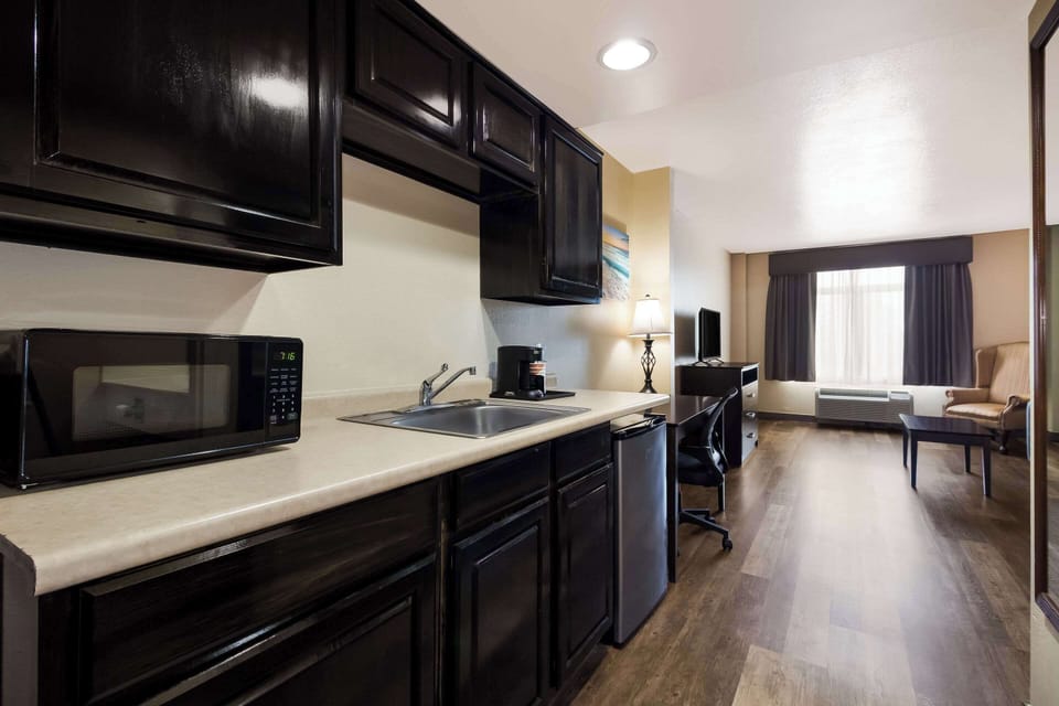 Suite, 2 Double Beds, Non Smoking | Desk, laptop workspace, iron/ironing board, free WiFi