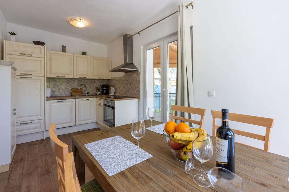 Villa | Private kitchen | Fridge, oven, stovetop, dishwasher