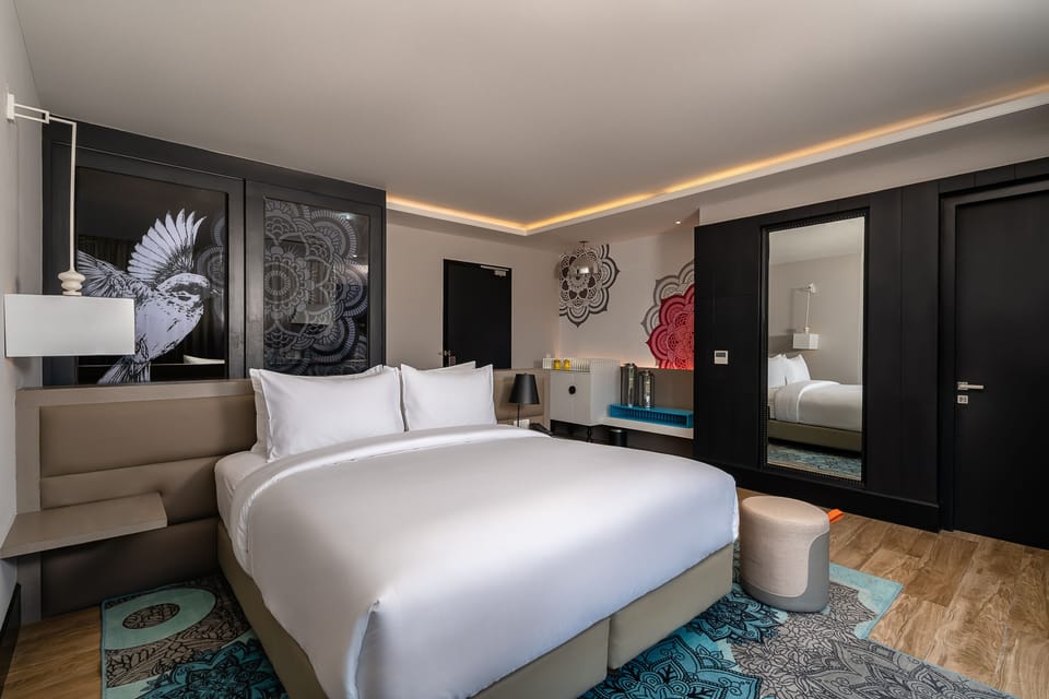 Premium bedding, pillowtop beds, minibar, in-room safe
