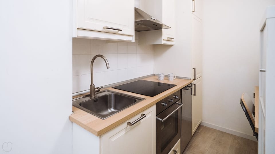 Apartment (1 Bedroom) | Private kitchen | Microwave, espresso maker, highchair