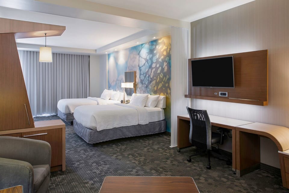 Suite, Multiple Beds | Premium bedding, memory foam beds, blackout drapes, iron/ironing board