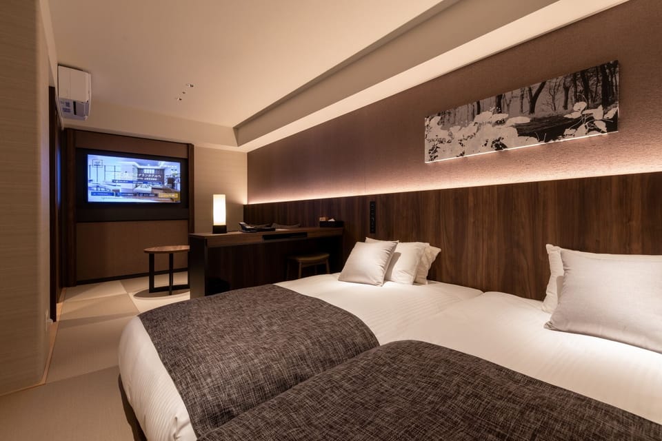 Down comforters, desk, blackout drapes, soundproofing