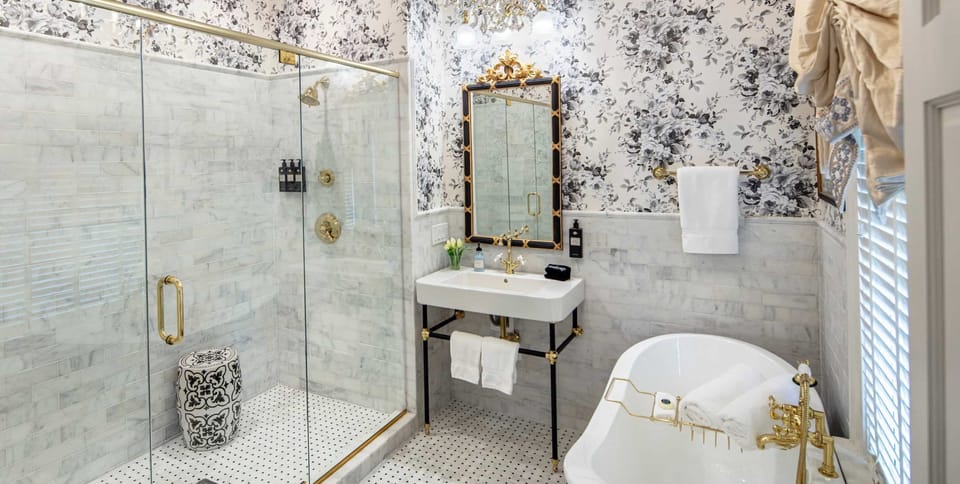 Arlington | Bathroom | Deep soaking tub, rainfall showerhead, hair dryer, bathrobes
