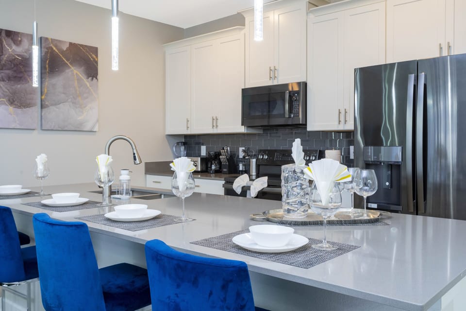 Family Townhome, 4 Bedrooms | Living area | 60-inch Smart TV with cable channels, Netflix, Hulu