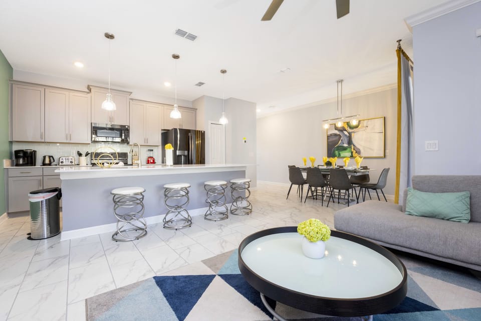 Family Townhome, 4 Bedrooms | Living area | 60-inch Smart TV with cable channels, Netflix, Hulu