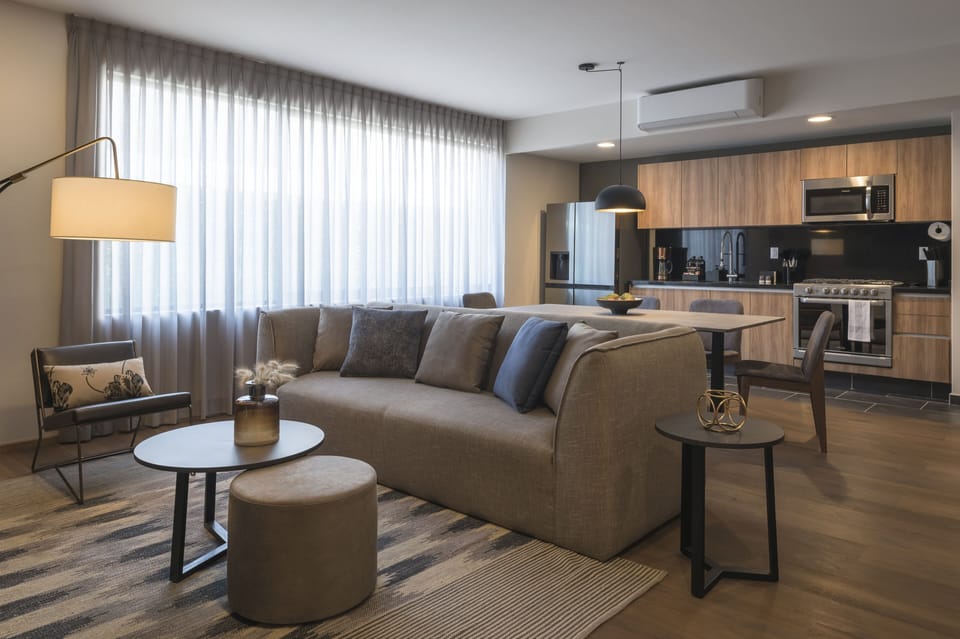 Deluxe Suite | Private kitchen | Full-size fridge, microwave