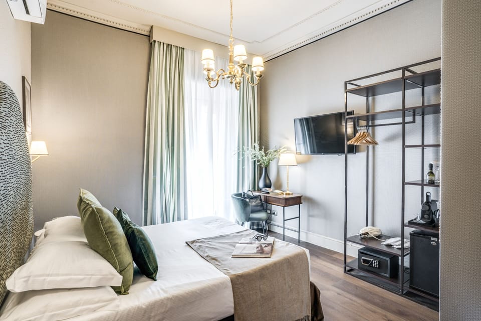 Deluxe Triple Room | Down comforters, memory foam beds, minibar, in-room safe