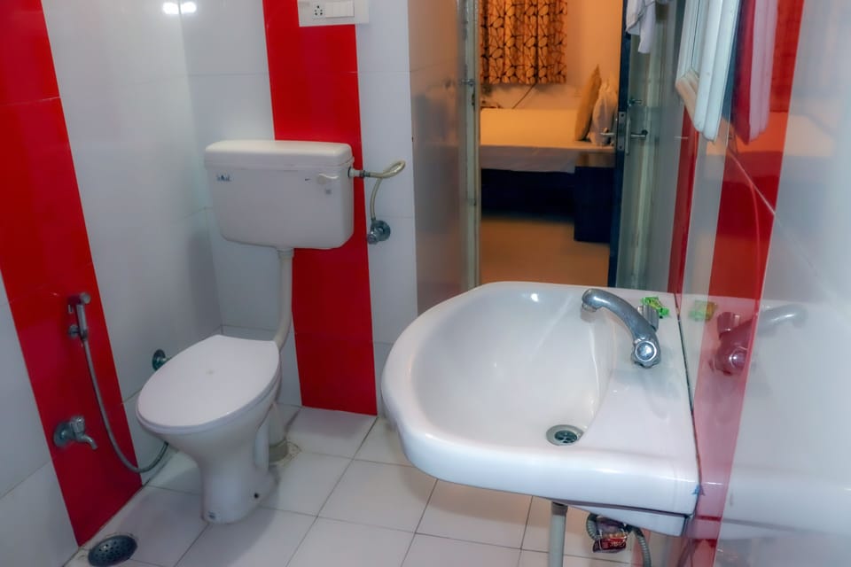 Deluxe Room | Bathroom | Slippers