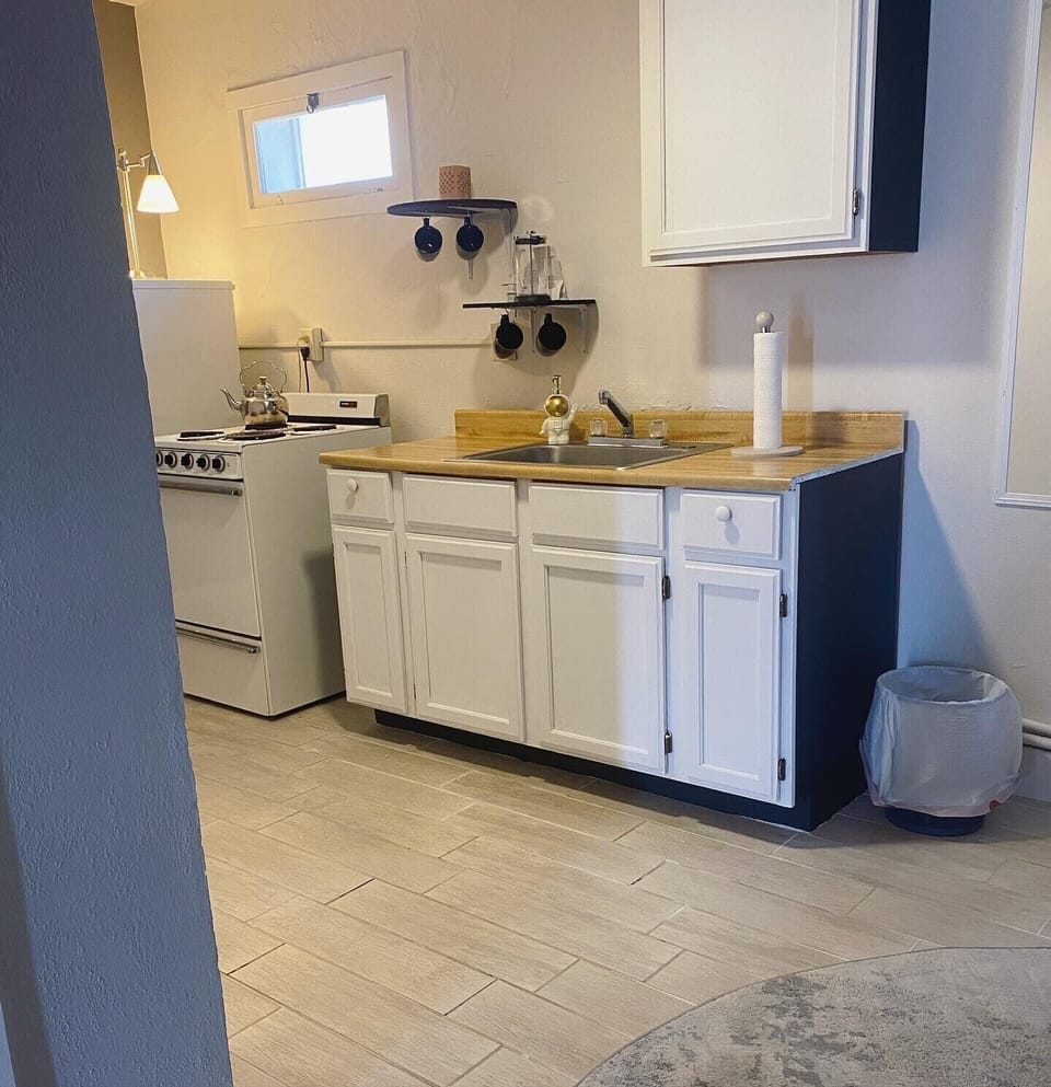 Classic Suite | Private kitchen | Coffee/tea maker, microwave (on request), oven, stovetop